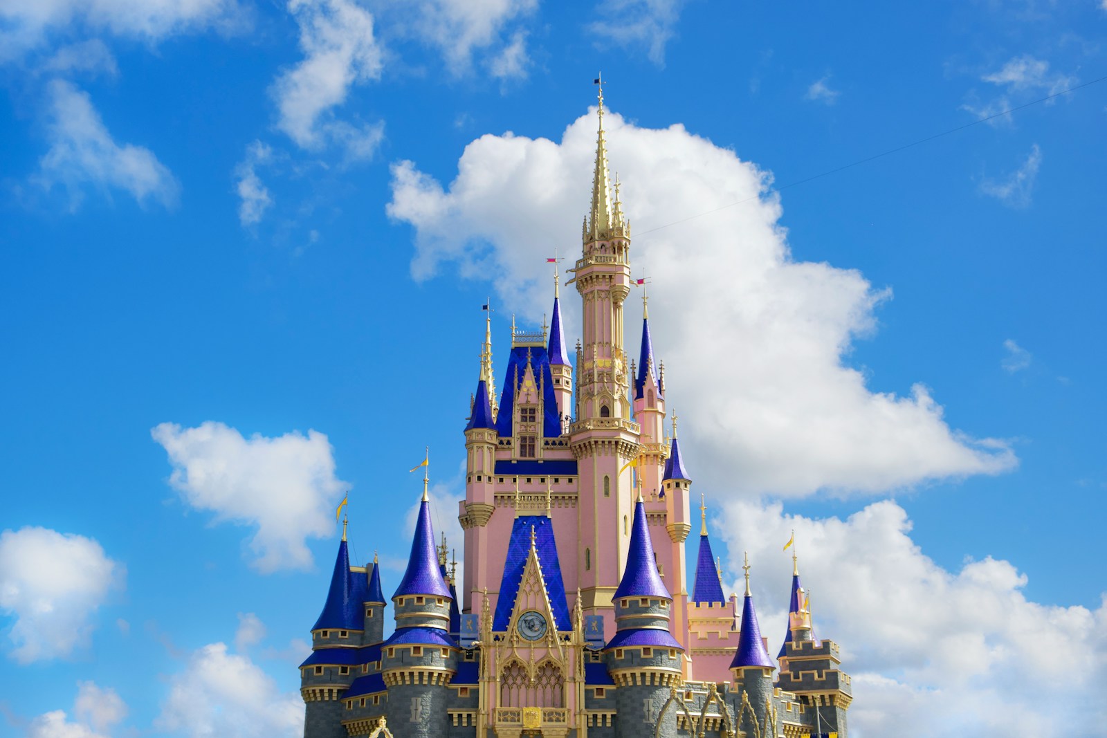 white and blue castle under blue sky during daytime